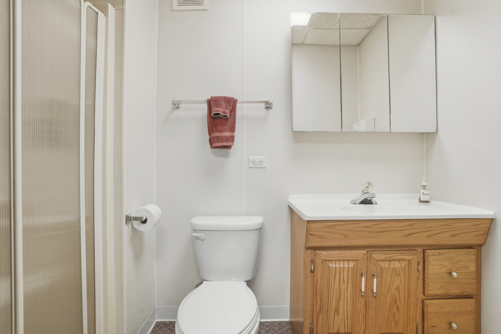1702 South Dixie Highway Crete, IL 60417 - Photo 23 of 50 a bathroom with a sink a toilet and a shower