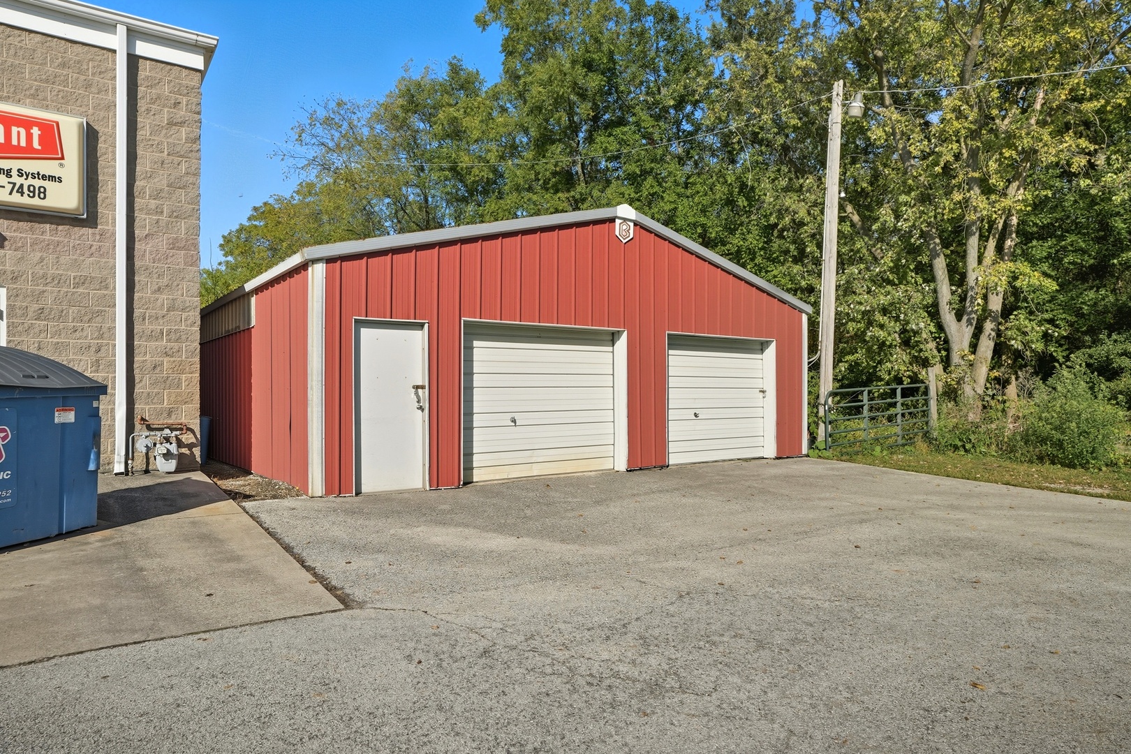 1702 South Dixie Highway Crete, IL 60417 - Photo 24 of 50 a view of a house with a yard and garage
