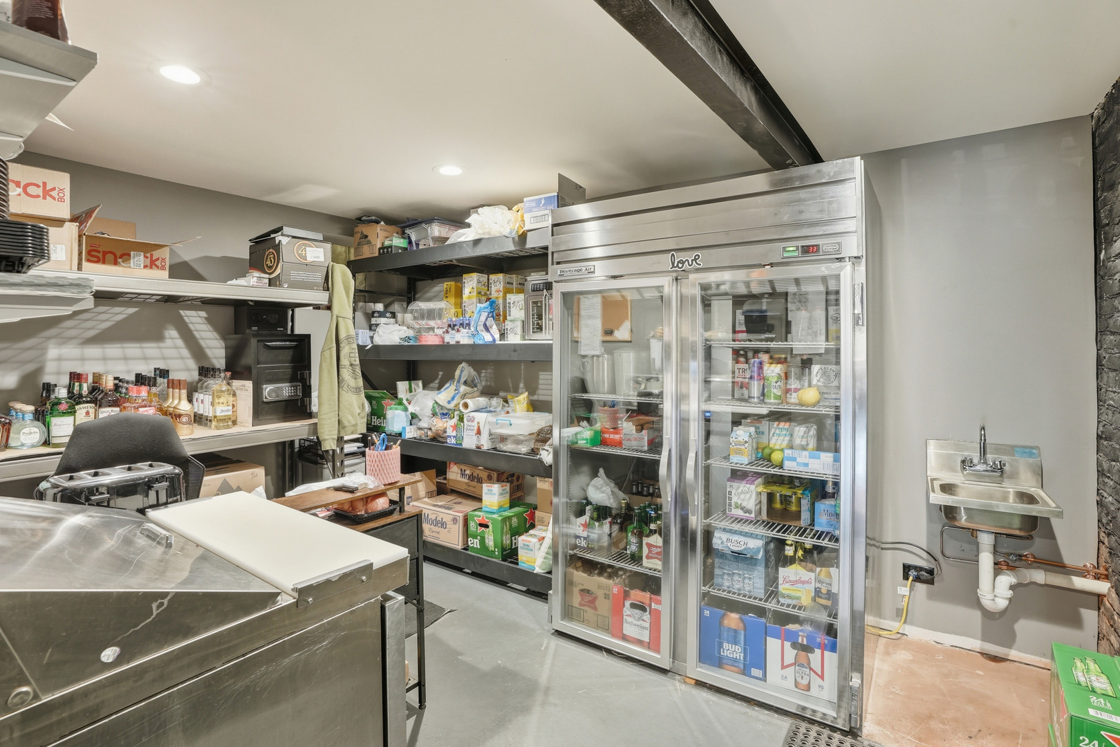 1702 South Dixie Highway Crete, IL 60417 - Photo 32 of 50 a room with lots of furniture and clutter