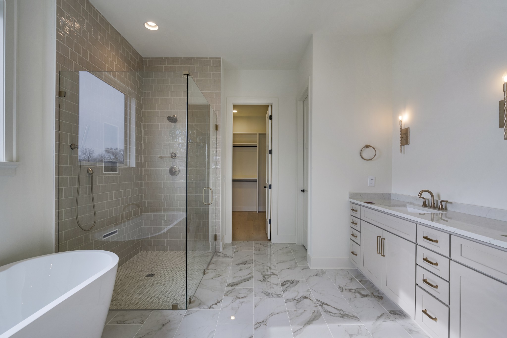 2004 Landry Place Franklin, TN 37064 - Photo 12 of 23 a spacious bathroom with a granite countertop sink mirror and bathtub