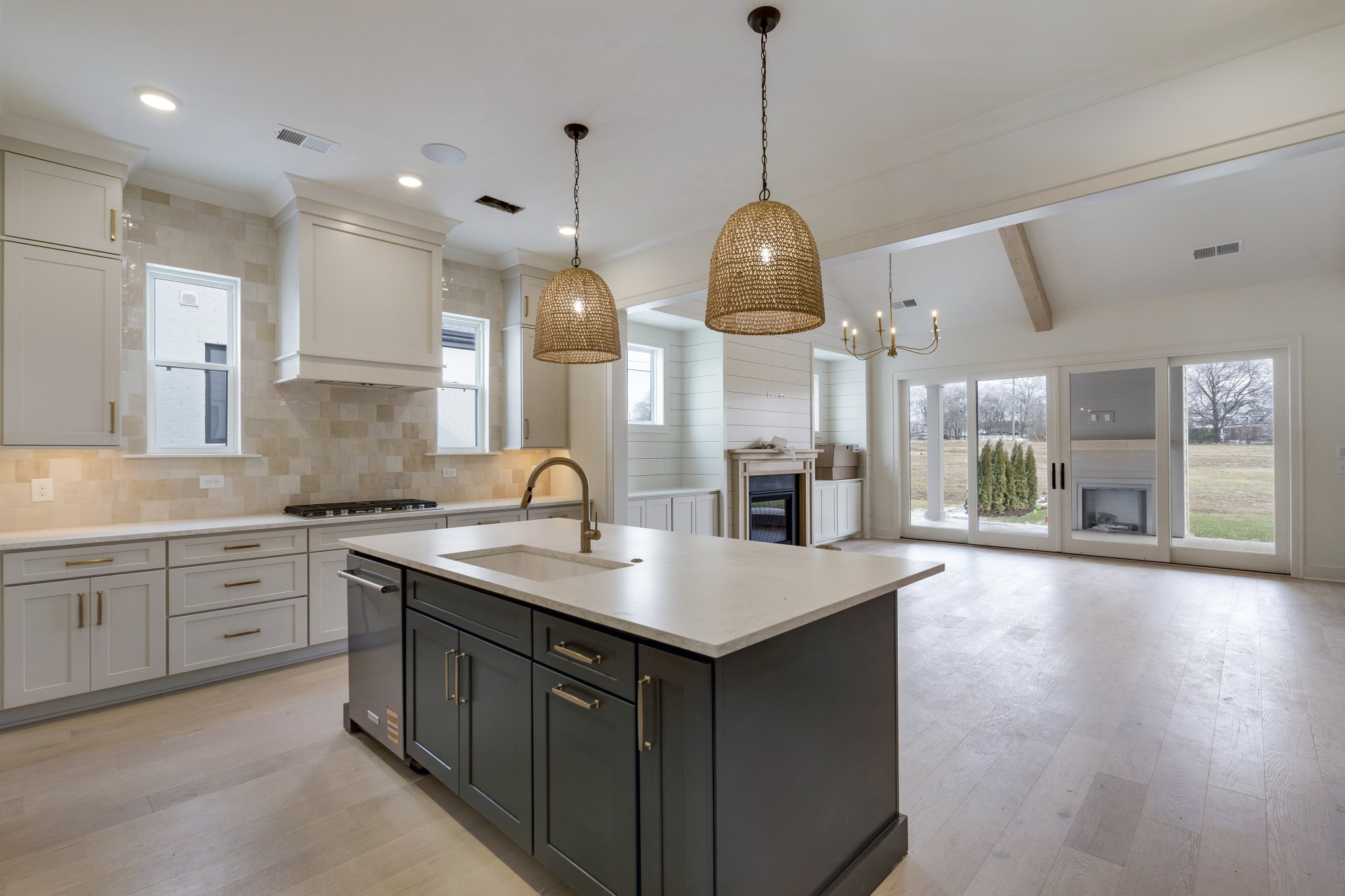 2004 Landry Place Franklin, TN 37064 - Photo 5 of 23 a open kitchen with stainless steel appliances granite countertop a sink a refrigerator and a wooden floor