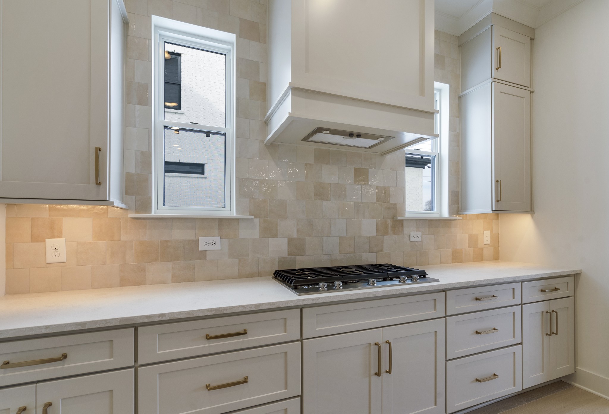 2004 Landry Place Franklin, TN 37064 - Photo 8 of 23 a kitchen with granite countertop white cabinets and stainless steel appliances