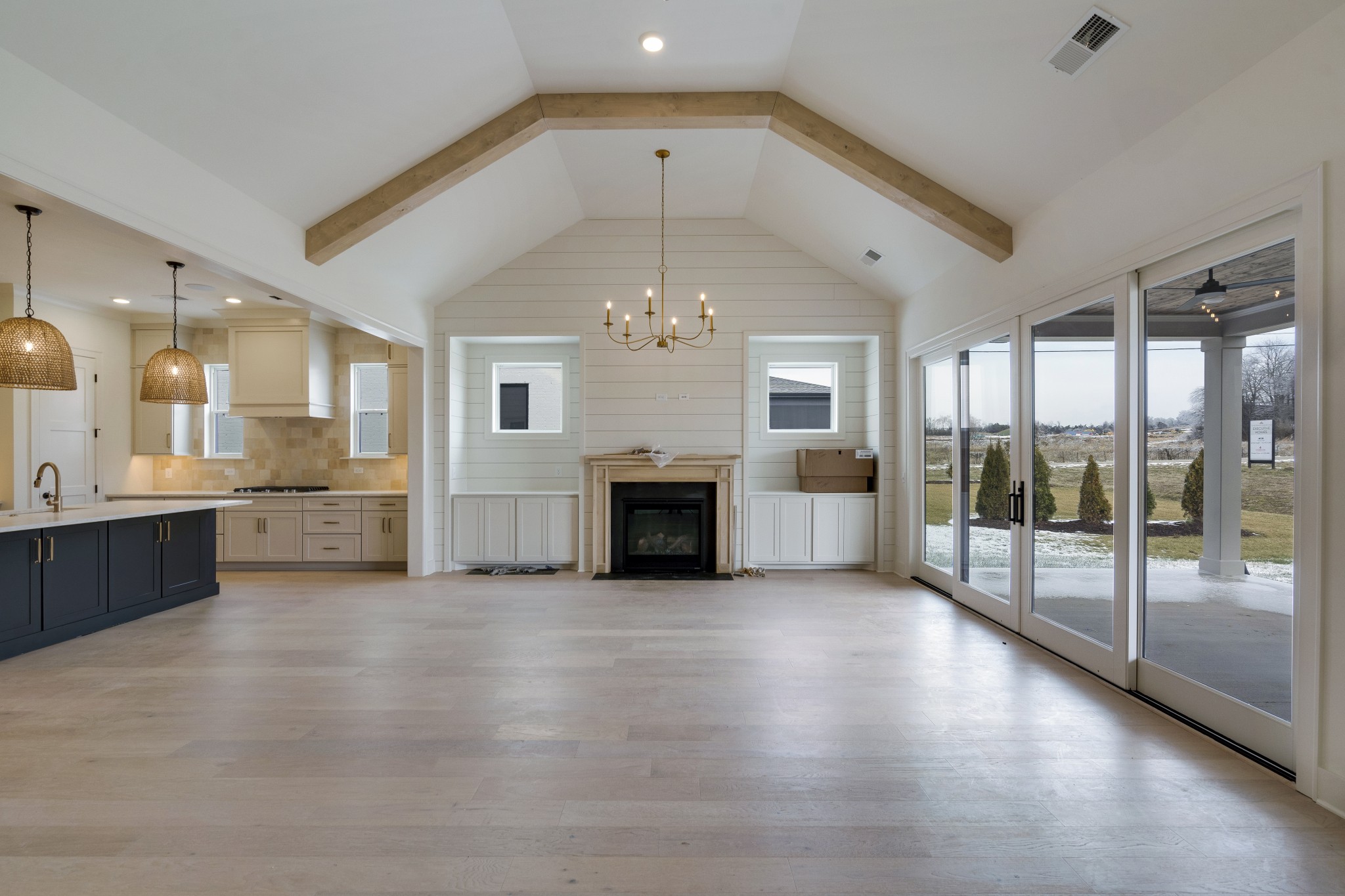 2004 Landry Place Franklin, TN 37064 - Photo 9 of 23 a view of a big room with windows and fireplace