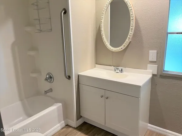 a bathroom with a toilet and a sink