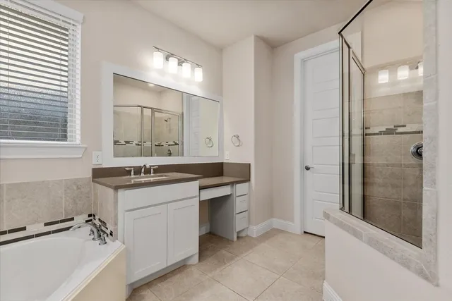 a bathroom with a granite countertop sink mirror and double