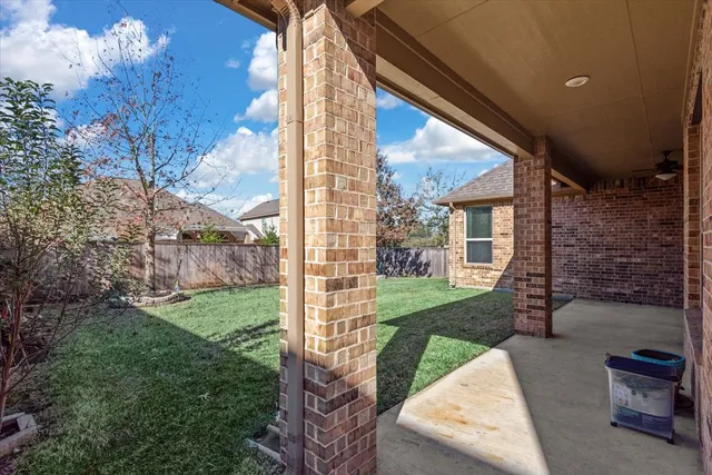 a view of a porch in front of house