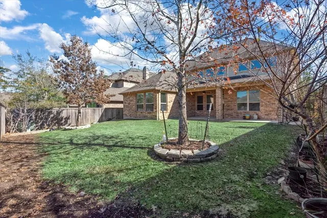 a swimming pool with a trees in the background