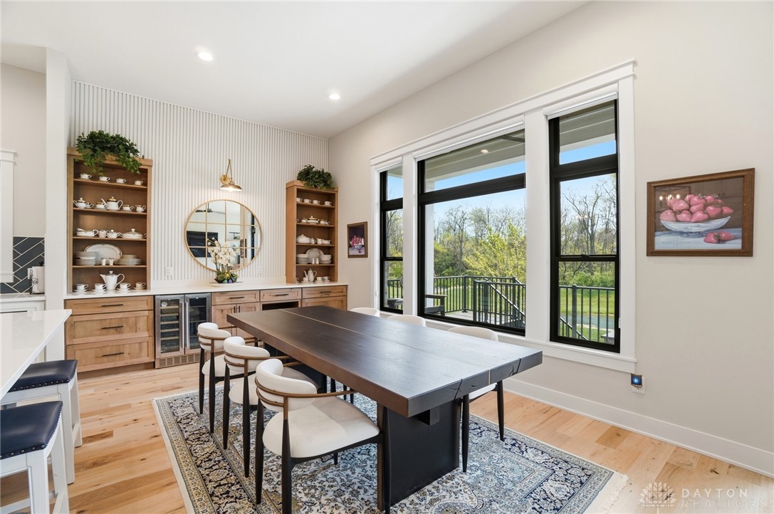 1247 Normandy Rue Dayton, OH 45458 - Photo 16 of 76 This bright dining area offers expansive outdoor views and hardwood flooring.