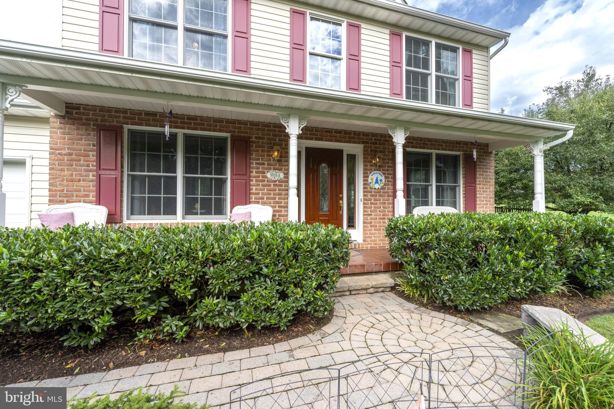 9816 Magledt Road Baltimore, MD 21234 - Photo 4 of 57 Stone Walkway and Front Porch