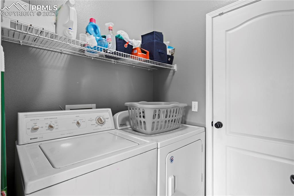 803 Ridgebury Place Fountain, CO 80817 - Photo 23 of 45 a close view of laundry room with washer and dryer