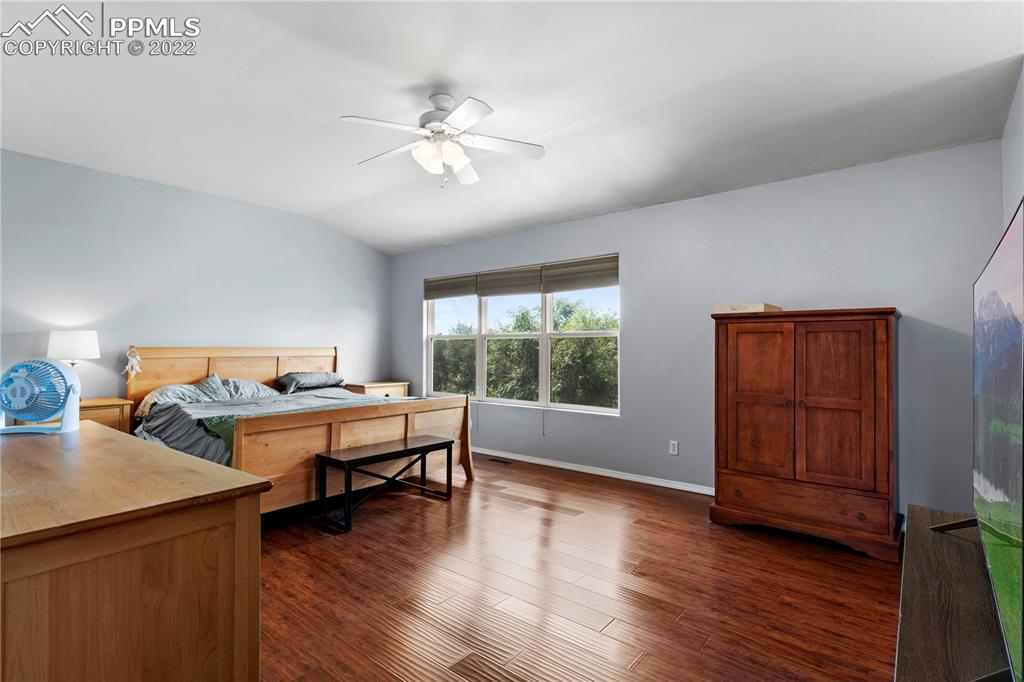 803 Ridgebury Place Fountain, CO 80817 - Photo 28 of 45 a living room with furniture and wooden floor