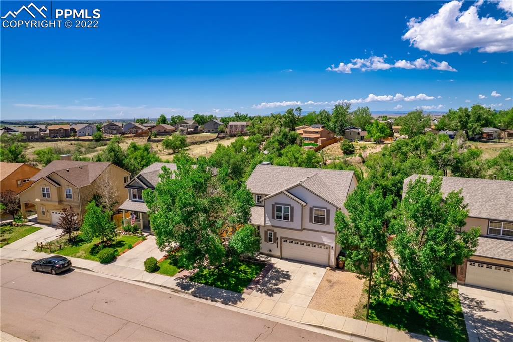 803 Ridgebury Place Fountain, CO 80817 - Photo 34 of 45 an aerial view of a house with a yard