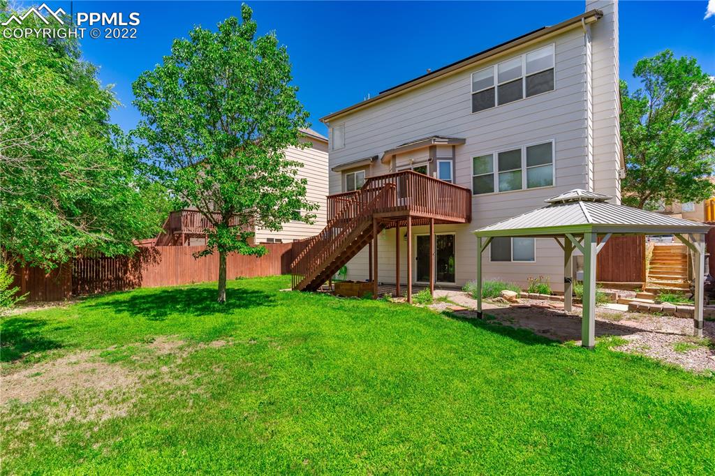 803 Ridgebury Place Fountain, CO 80817 - Photo 5 of 45 a view of a house with a yard