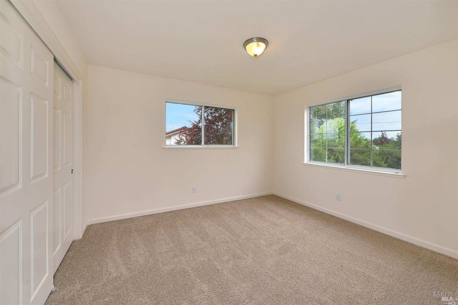 3980 Stony Point Road Santa Rosa, CA 95407 - Photo 14 of 42 an empty room with windows