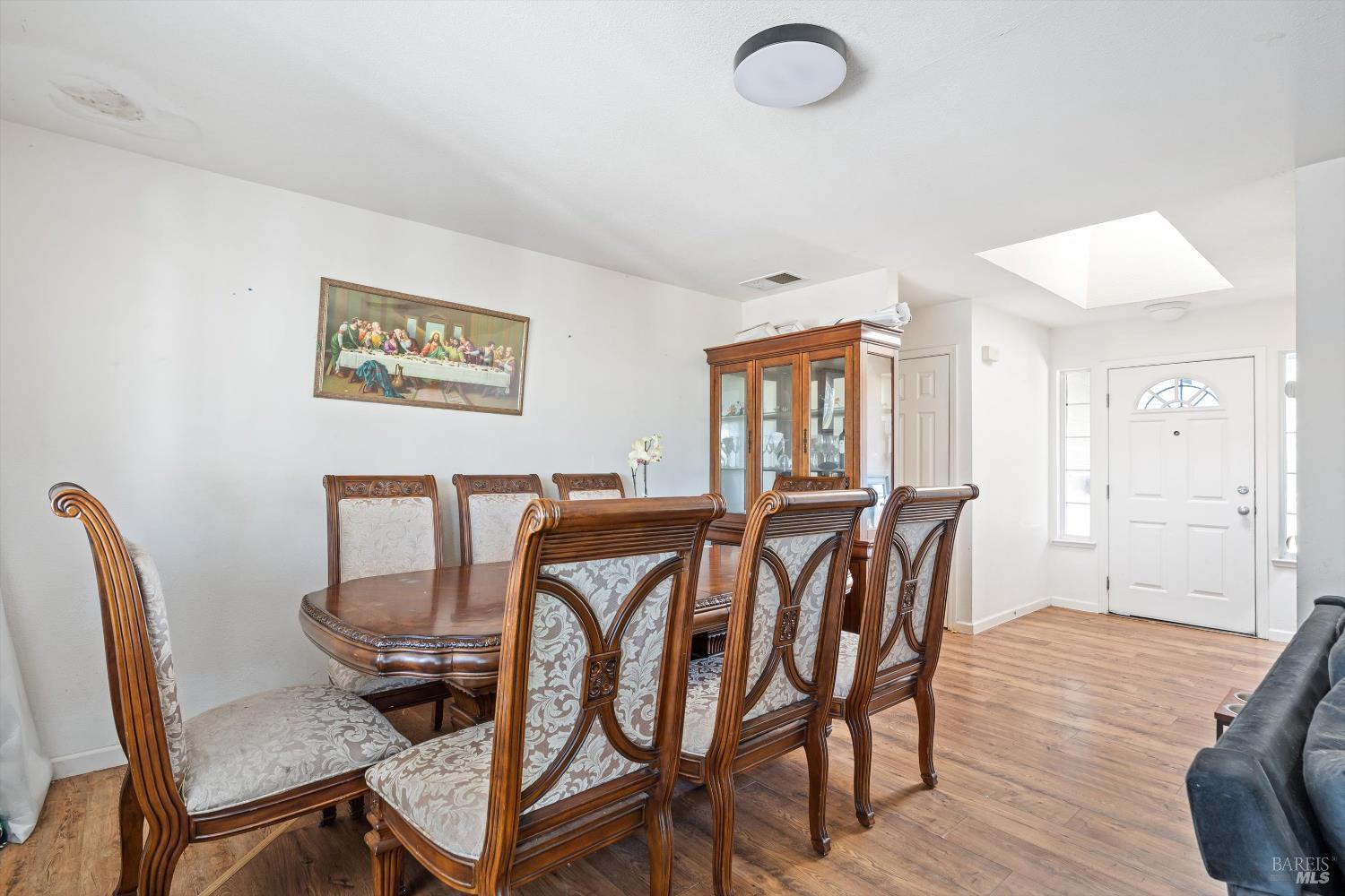 3980 Stony Point Road Santa Rosa, CA 95407 - Photo 15 of 31 a view of a dining room with furniture and wooden floor