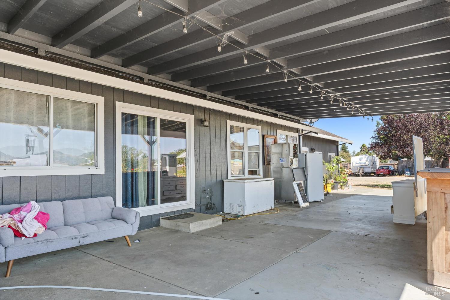 3980 Stony Point Road Santa Rosa, CA 95407 - Photo 17 of 31 a view of a porch with furniture