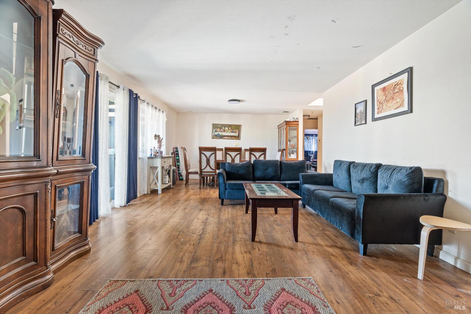 3980 Stony Point Road Santa Rosa, CA 95407 - Photo 20 of 42 a living room with furniture and a fireplace