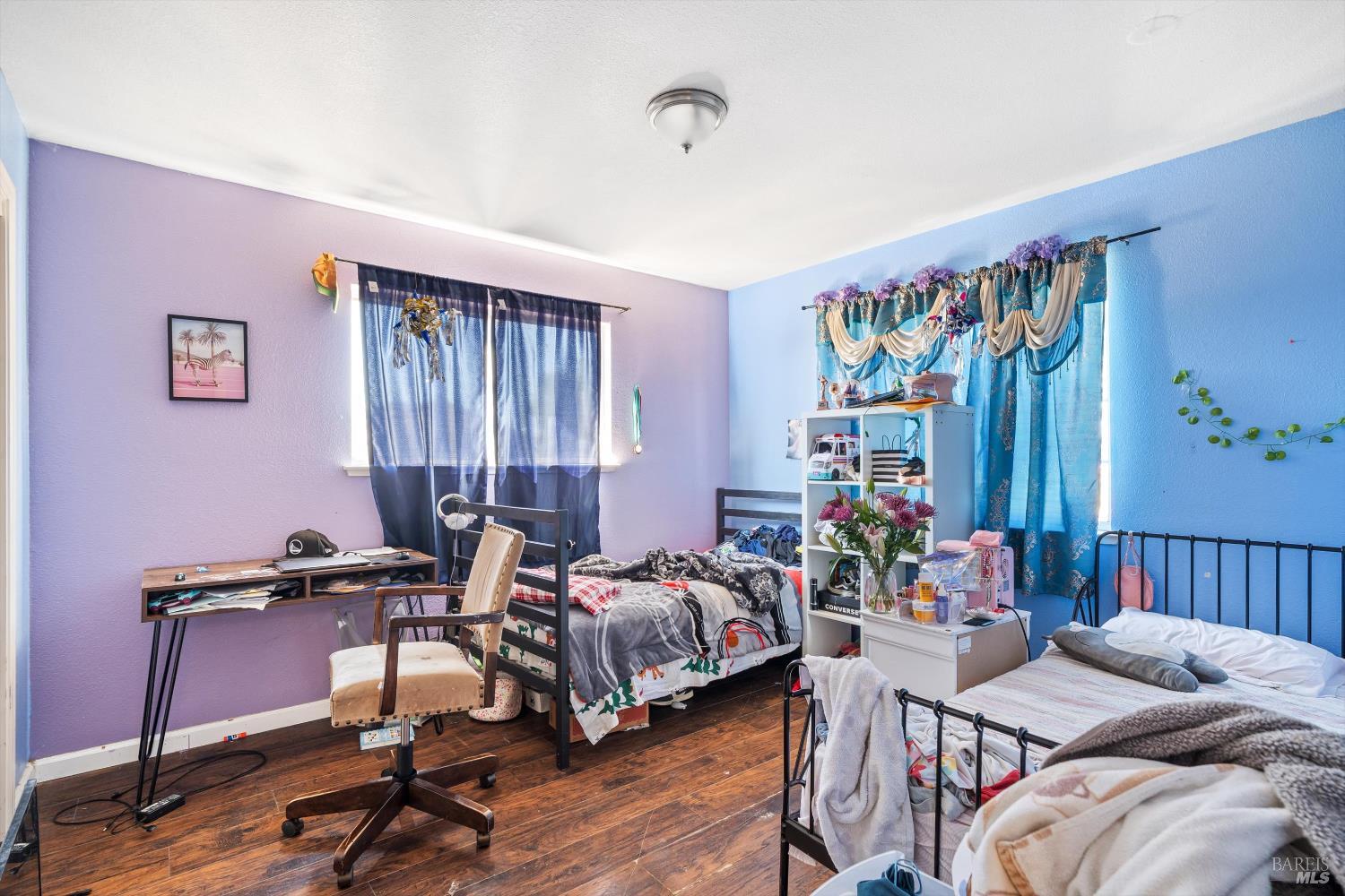 3980 Stony Point Road Santa Rosa, CA 95407 - Photo 24 of 42 a bedroom with furniture and a window