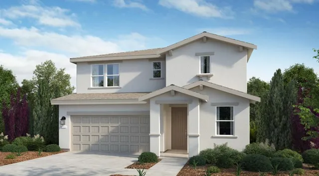 a front view of a house with a garage