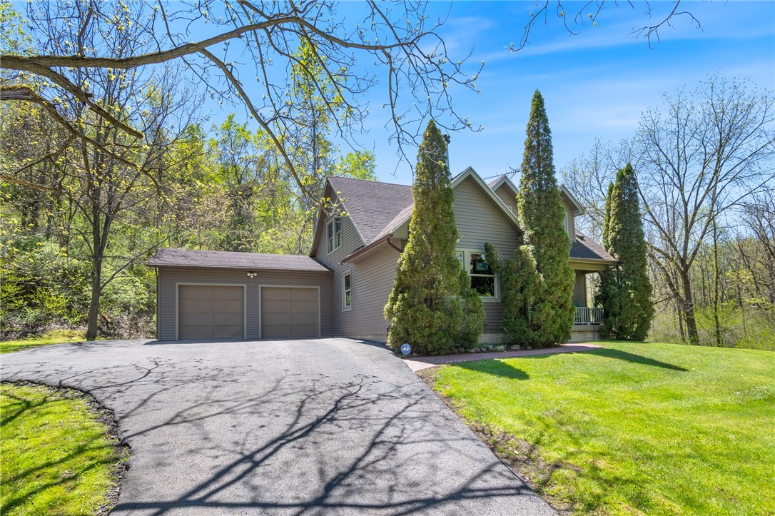 4397 Sebring Road Sodus, NY 14551 - Photo 4 of 43 The driveway back to this home - the gentle slope