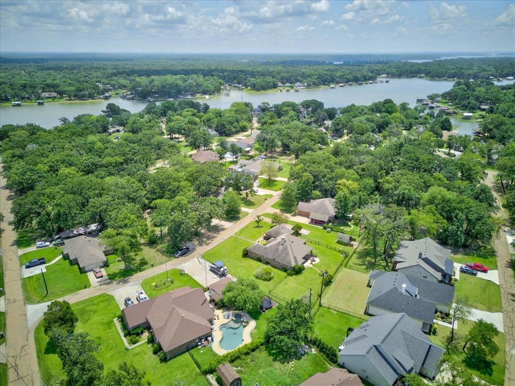 111 Trailwood Road Enchanted Oaks, TX 75156 - Photo 30 of 33 an aerial view of a house with a garden