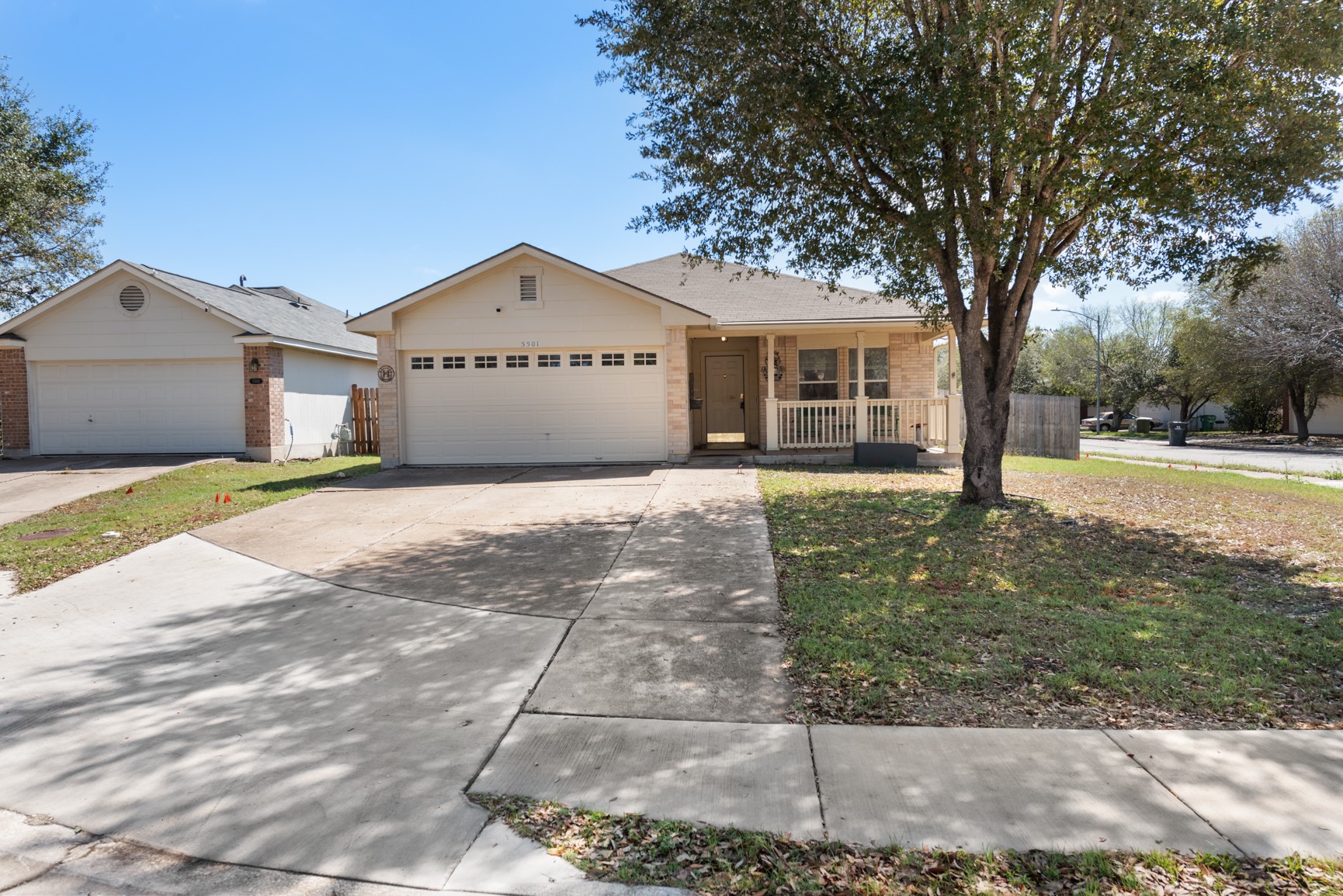 5501 English Avenue Austin, TX 78724 - Photo 1 of 19 a front view of a house with a yard and garage