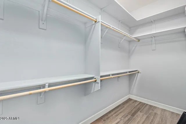 a view of an empty walk in closet