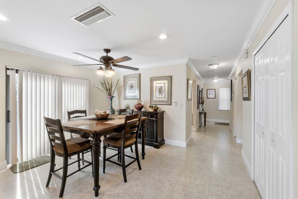 21452 Juego Circle, Unit 31A Boca Raton, FL 33433 - Photo 17 of 38 a view of a livingroom and dining room