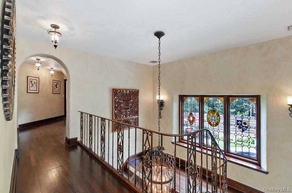 21 Hampshire Road Bronxville, NY 10708 - Photo 16 of 41 View of the second level showcases the spectacular stained glass windows and leads to three bedrooms and three full bathrooms and three full spa-style bathrooms, including the incredible primary bedroom suite.