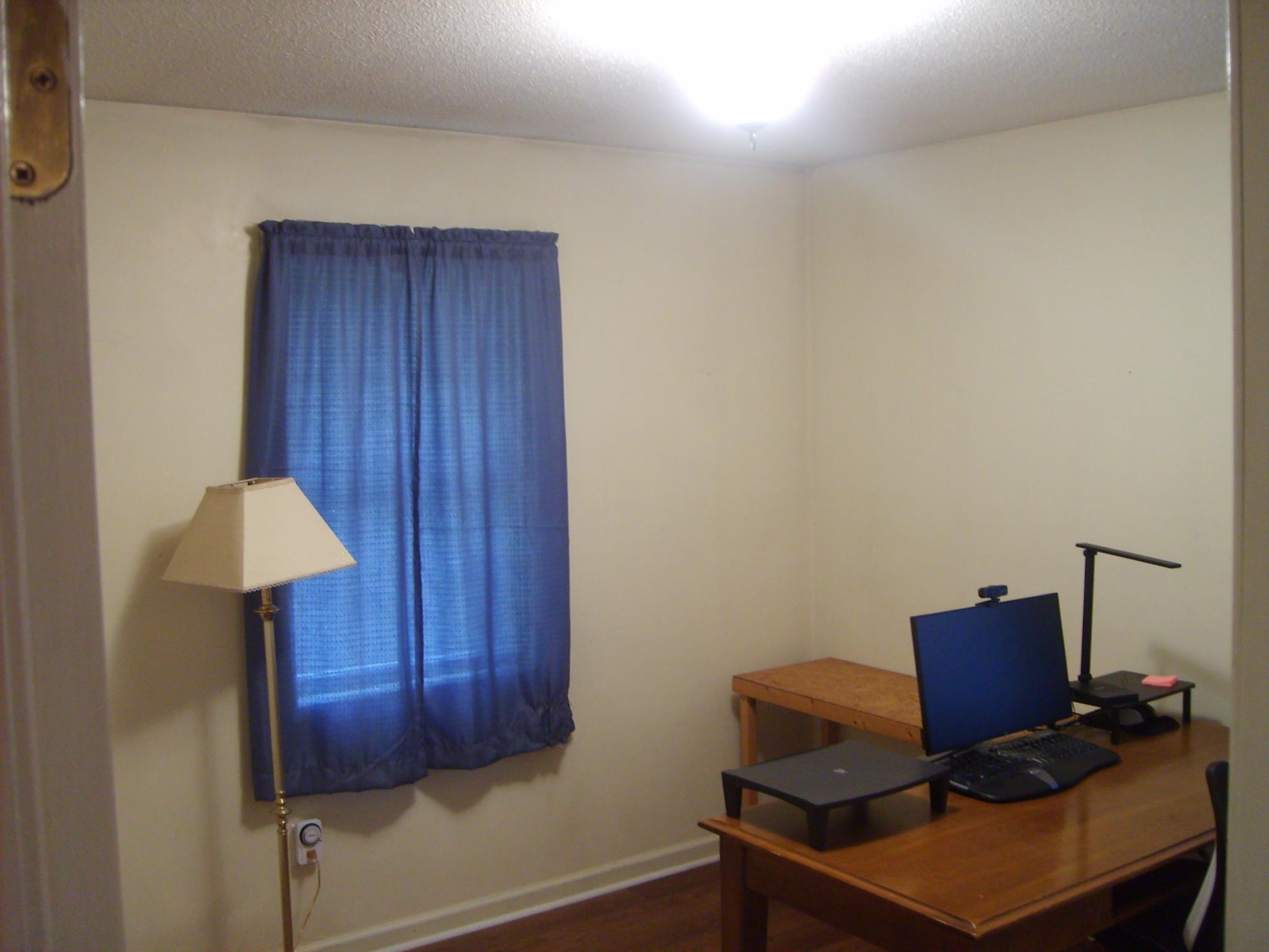605 Blue Bonnett Road Bolivar, TN 38008 - Photo 15 of 18 a living room with furniture and a window