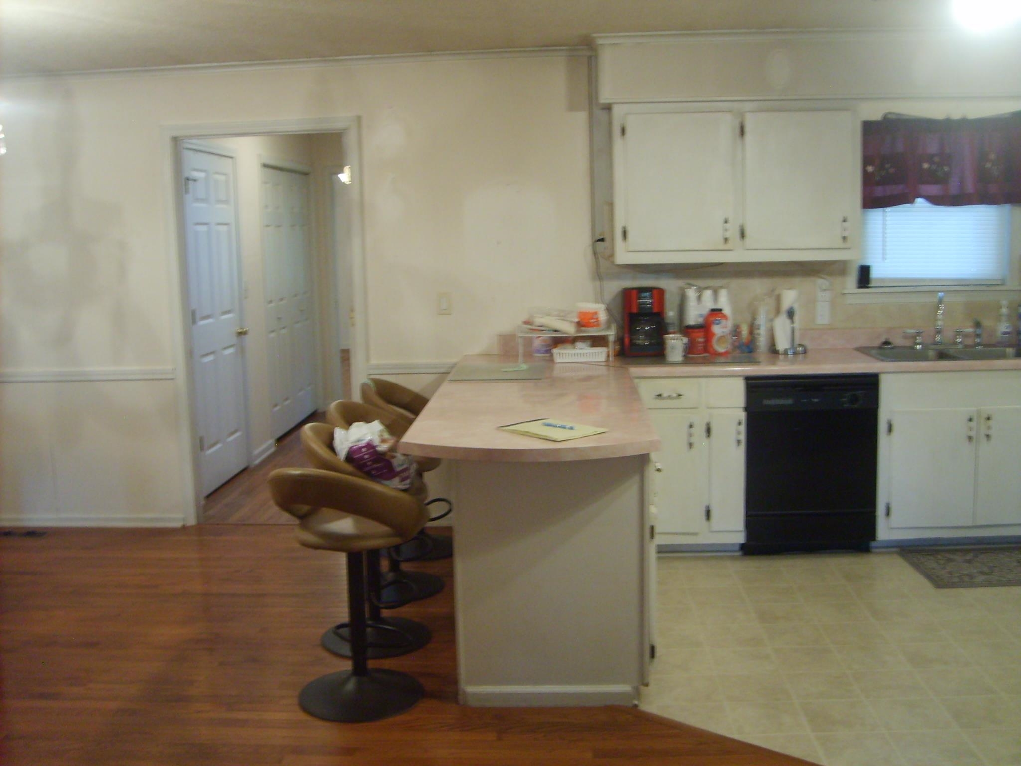 605 Blue Bonnett Road Bolivar, TN 38008 - Photo 18 of 18 a room with a sink cabinets and utility room
