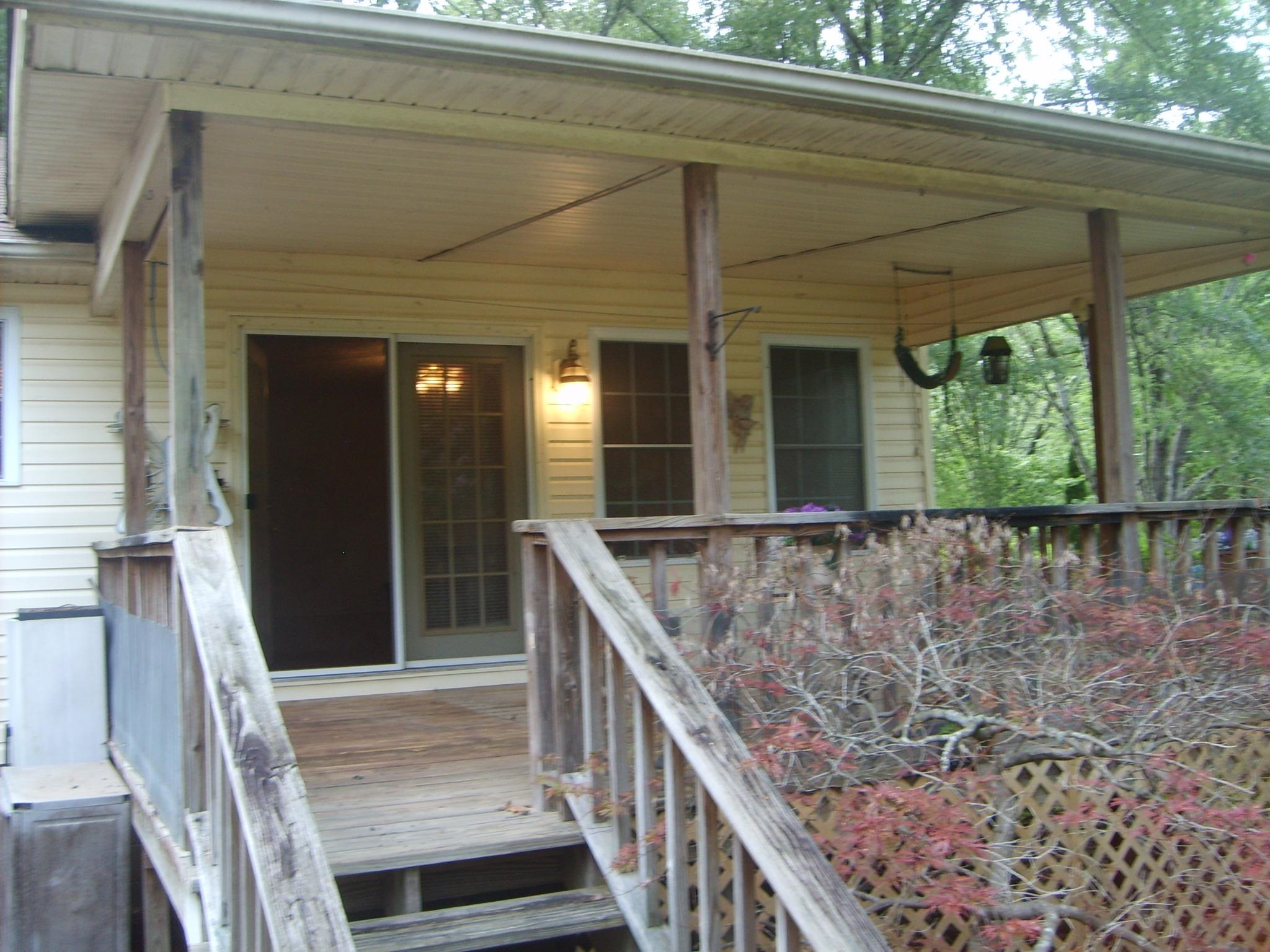 605 Blue Bonnett Road Bolivar, TN 38008 - Photo 3 of 18 a view of balcony with wooden floor