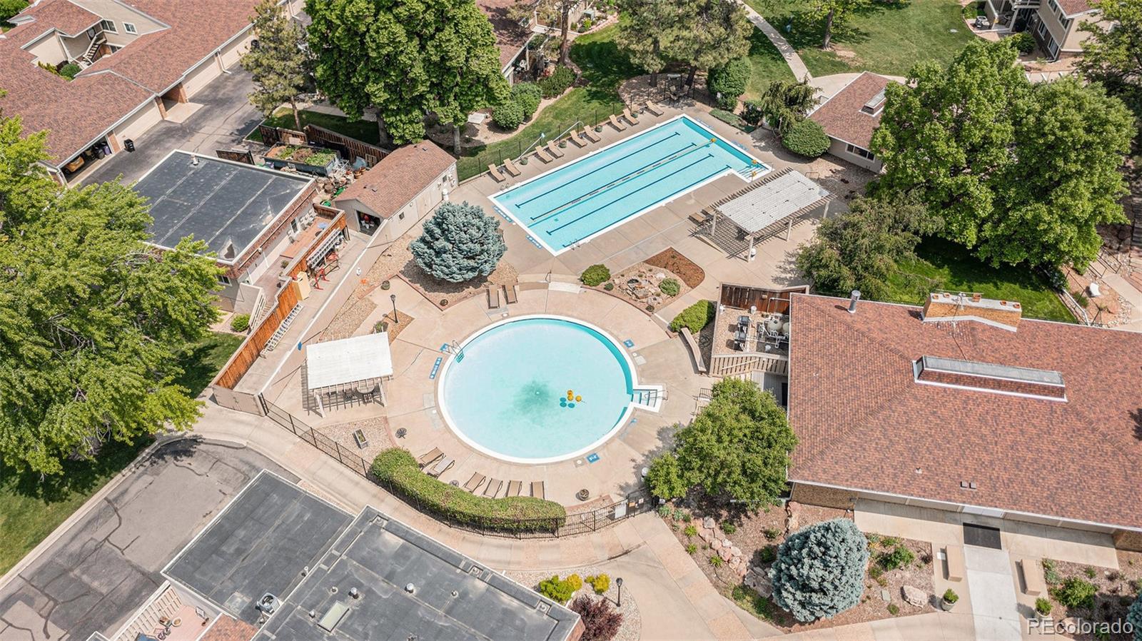 3210 South Oneida Way Denver, CO 80224 - Photo 20 of 28 an aerial view of a house with outdoor space and a lake view
