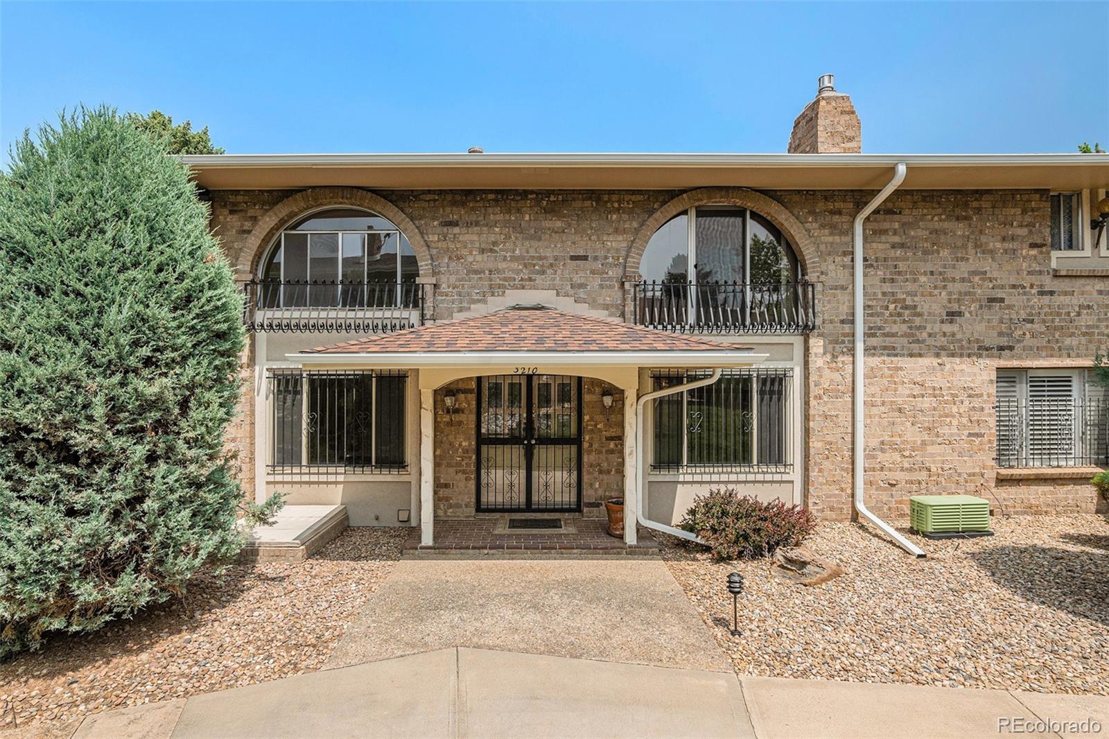 3210 South Oneida Way Denver, CO 80224 - Photo 23 of 28 a front view of a house