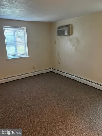 an empty room with a workbench