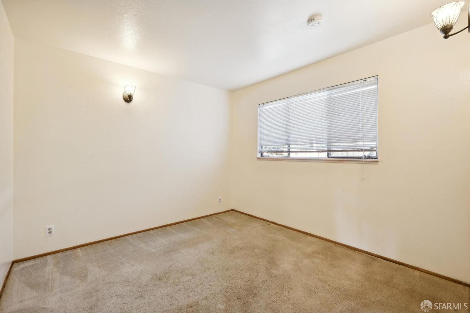 2521 Sherwood Drive San Bruno, CA 94066 - Photo 24 of 39 an empty room with a window
