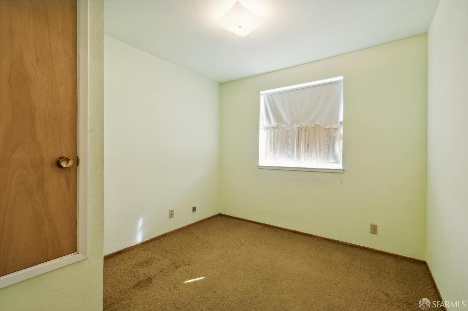 2521 Sherwood Drive San Bruno, CA 94066 - Photo 28 of 39 an empty room with a window