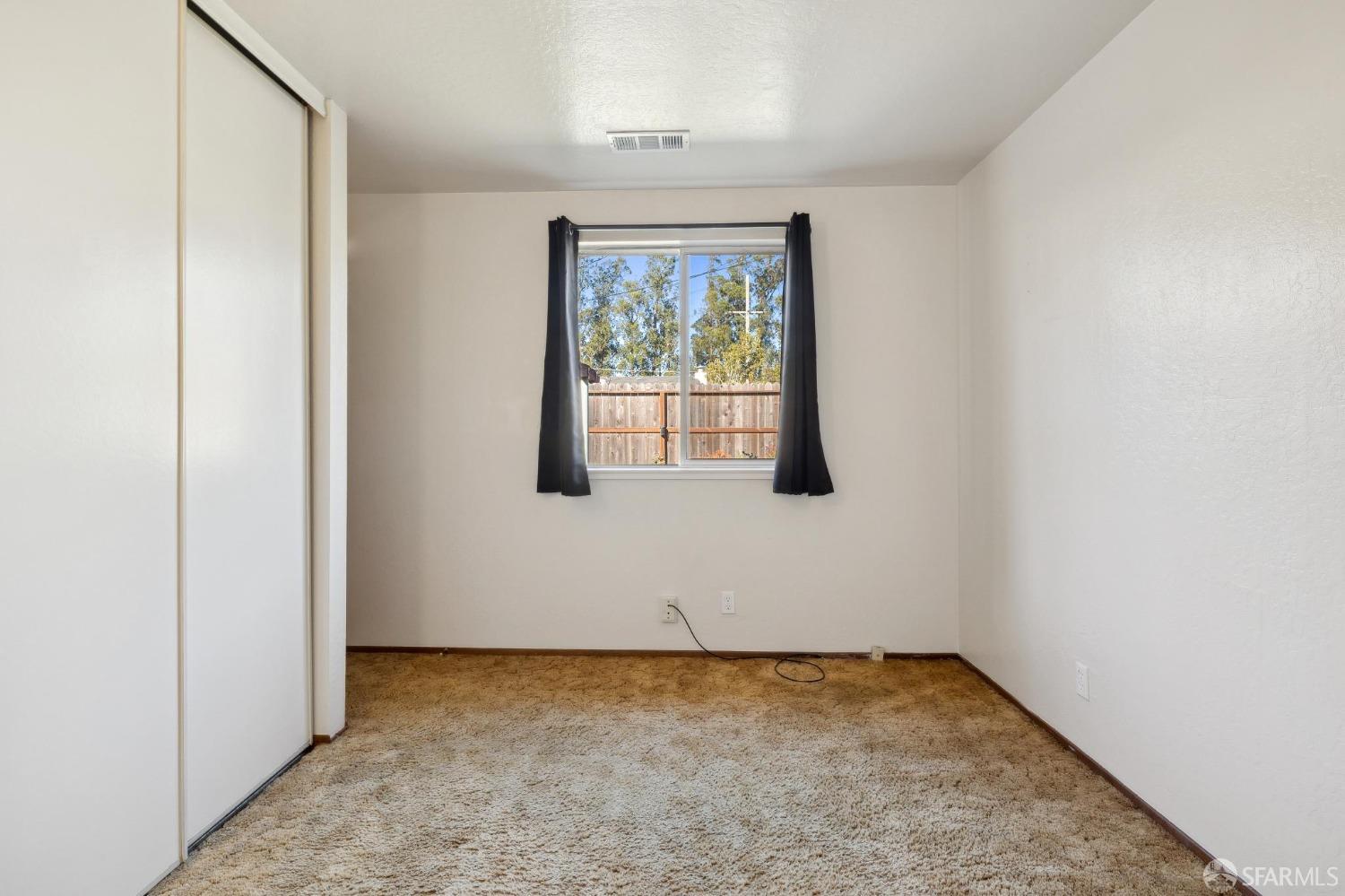 2521 Sherwood Drive San Bruno, CA 94066 - Photo 33 of 39 an empty room with windows