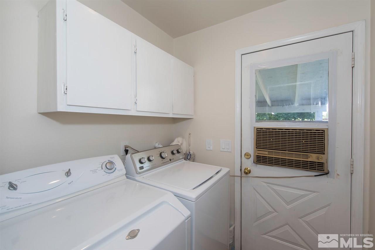 10785 Santa Fe Road Reno, NV 89508 - Photo 15 of 25 a utility room with dryer and washer