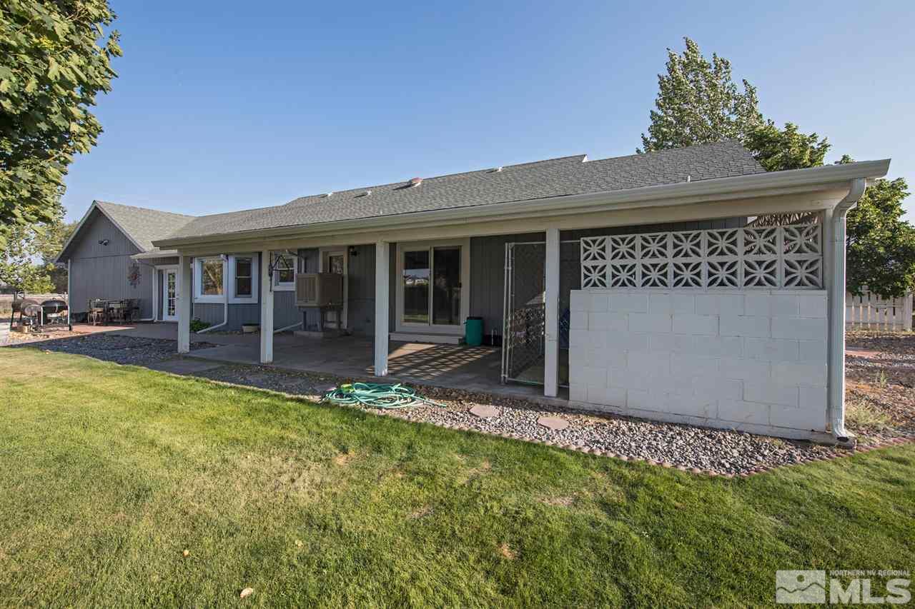 10785 Santa Fe Road Reno, NV 89508 - Photo 19 of 25 a view of a house with backyard porch and sitting area