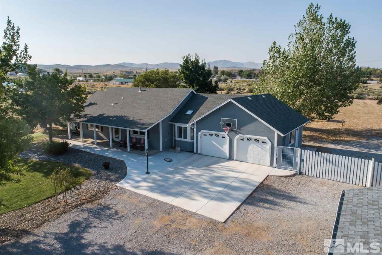 10785 Santa Fe Road Reno, NV 89508 - Photo 21 of 25 an aerial view of a house with a yard
