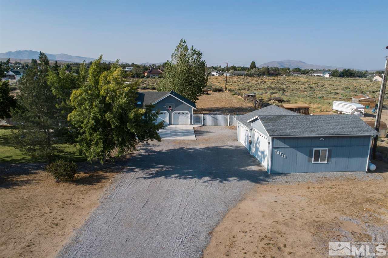 10785 Santa Fe Road Reno, NV 89508 - Photo 22 of 25 a front view of a house with a yard