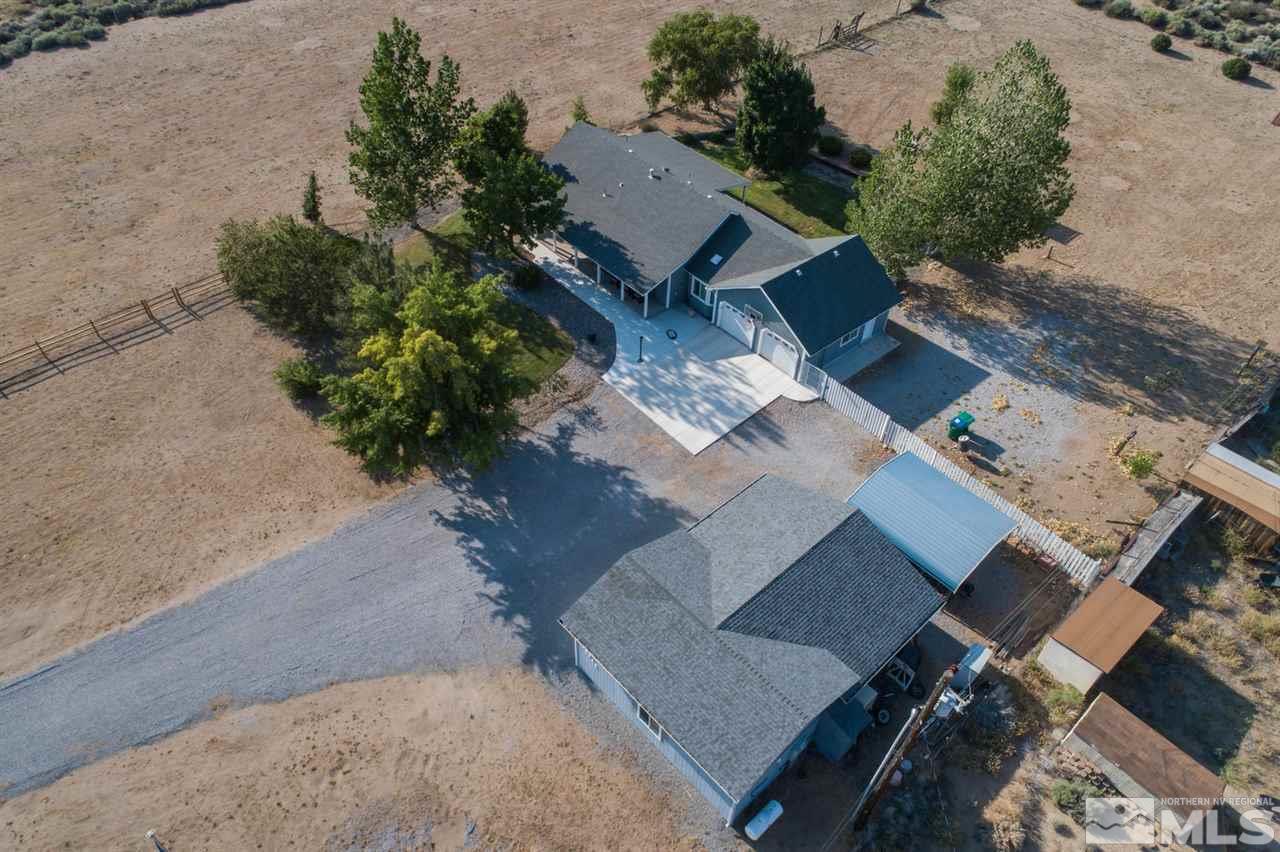 10785 Santa Fe Road Reno, NV 89508 - Photo 23 of 25 an aerial view of a house with a yard
