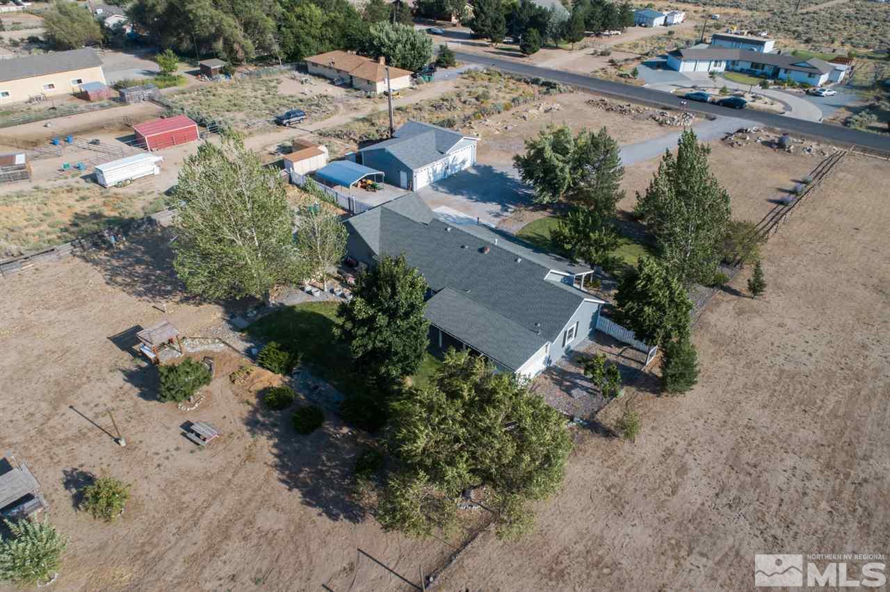 10785 Santa Fe Road Reno, NV 89508 - Photo 24 of 25 an aerial view of a house with a yard and lake view