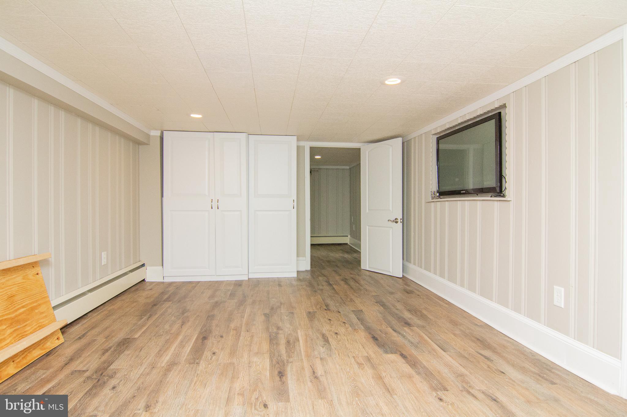 1313 Brehm Road Westminster, MD 21157 - Photo 34 of 37 Rec room new flooring