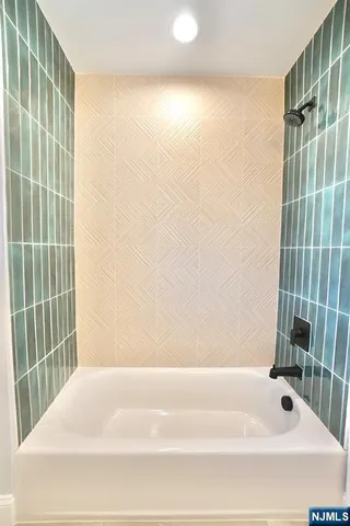 a bathroom with a bathtub