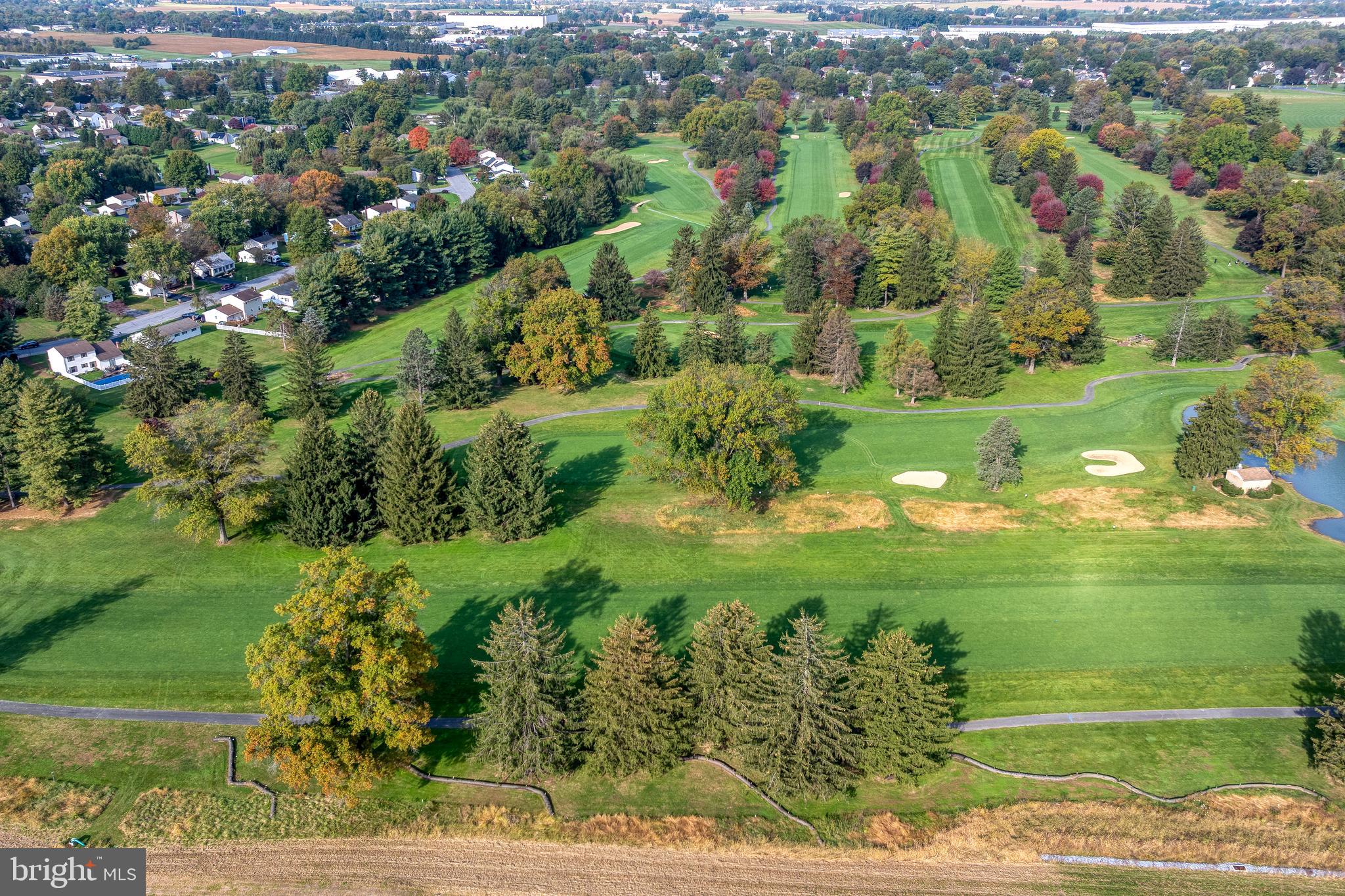 816 Tarpley Drive Lancaster, PA 17601 - Photo 101 of 110 a view of a garden with a lake