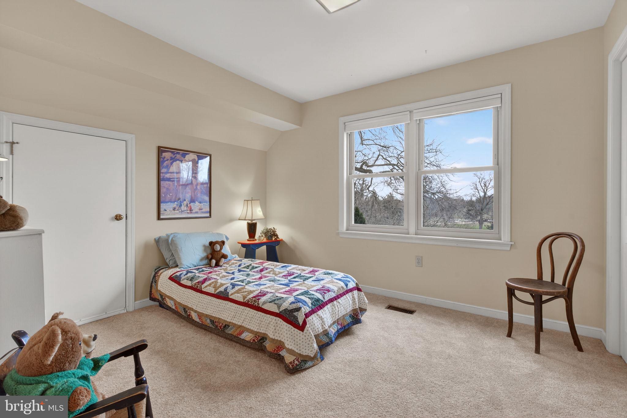 816 Tarpley Drive Lancaster, PA 17601 - Photo 41 of 110 a bedroom with a bed chair and two windows