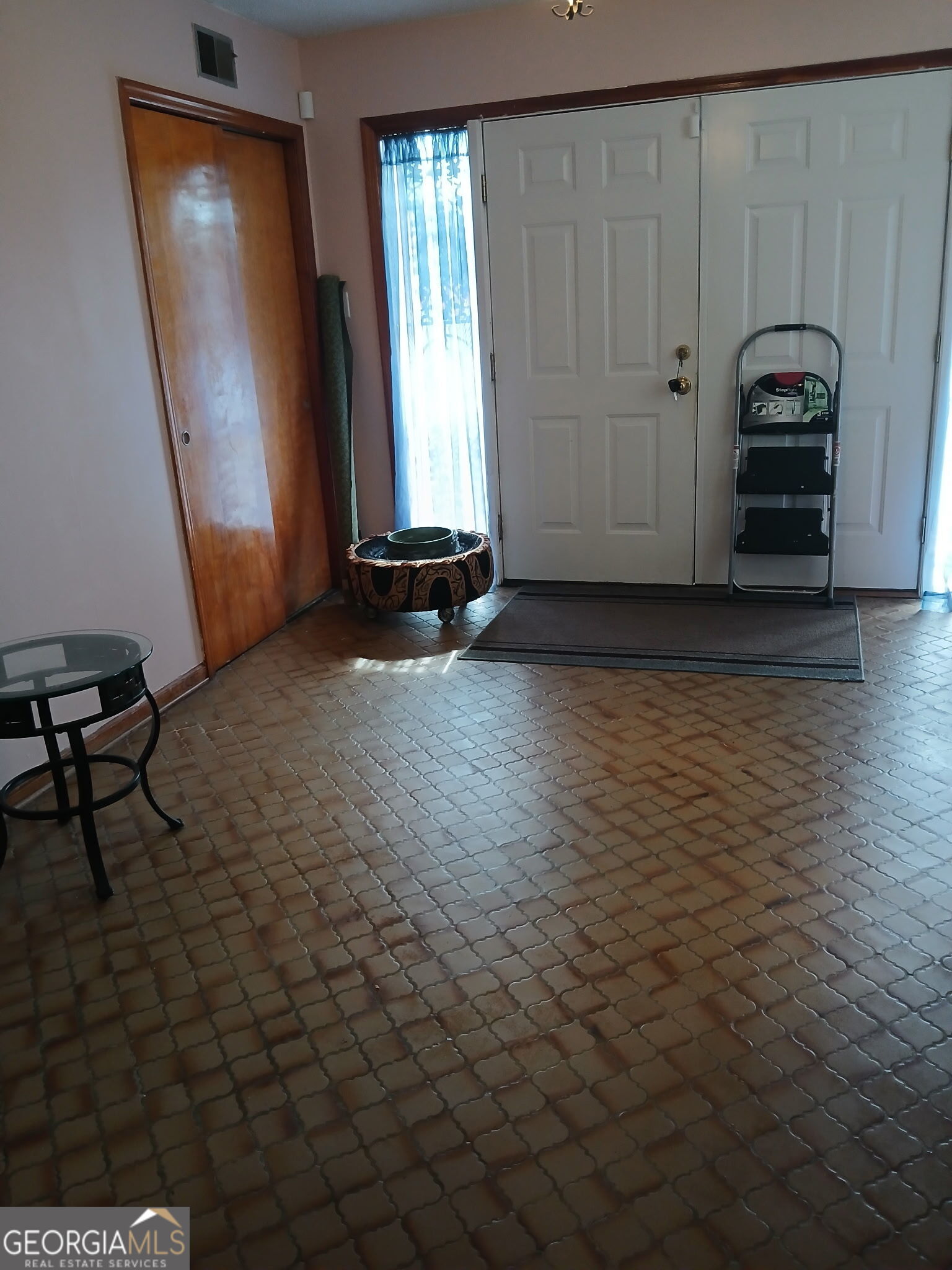 147 Golden Avenue Augusta, GA 30906 - Photo 2 of 2 an empty room with windows