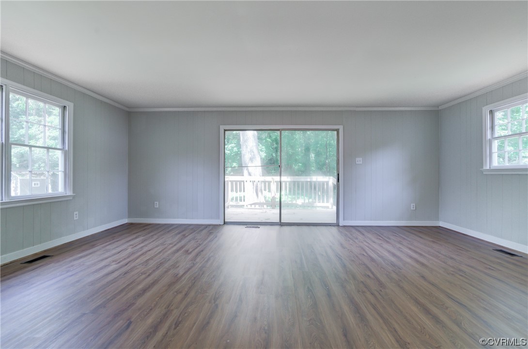 1510 Schloss Road Richmond, VA 23225 - Photo 12 of 28 an empty room with wooden floor and windows